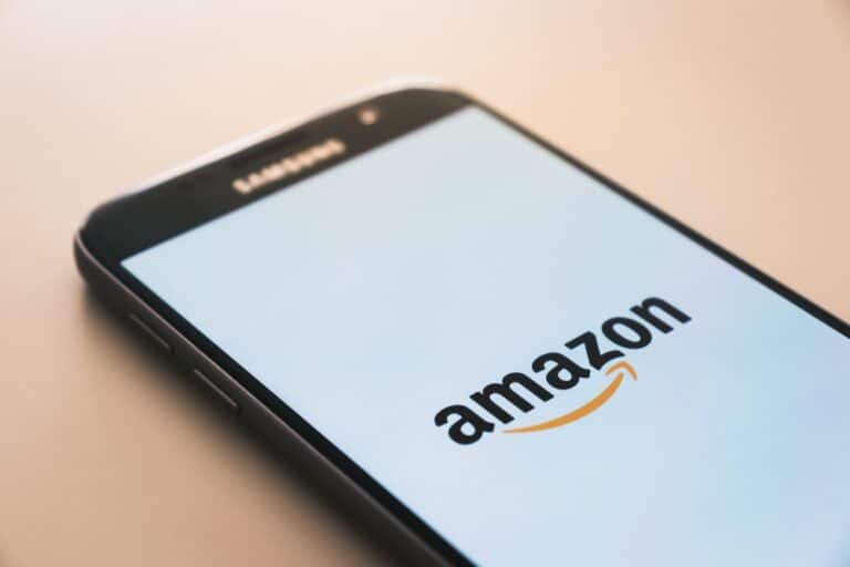A mobile phone showing an Amazon logo to suggest places where small businesses can sell online.